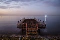 Desolated Dock On Sunset With Calm Sea Royalty Free Stock Photo