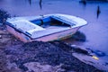 Desolated Rowboat On The Seashore