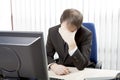 Despairing businessman at his desk