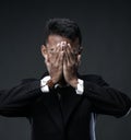 Desperate Businessman Covering Face. Losing Job Because World Recession Royalty Free Stock Photo