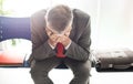 Desperate businessman in the waiting room Royalty Free Stock Photo