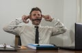 Desperate financial executive man in stress - corporate business lifestyle portrait of stressed and overwhelmed businessman Royalty Free Stock Photo