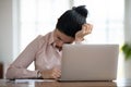 Desperate frustrated office woman crying at workplace