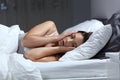 Desperate girl suffering insomnia trying to sleep Royalty Free Stock Photo