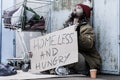 Desperate homeless and hungry tramp