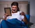 Desperate man divorced in bed