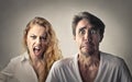 Desperate man and his girlfriend screaming towards him Royalty Free Stock Photo