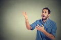 Desperate man screaming asking for help Royalty Free Stock Photo