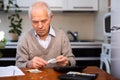 desperate old man pensioner counting his last money