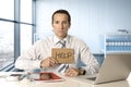 Desperate senior businessman in crisis working on computer laptop at office desk in stress under pressure Royalty Free Stock Photo