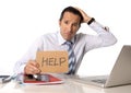 Desperate senior businessman in crisis working on computer at office in stress Royalty Free Stock Photo