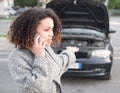 Desperate woman calling emergency help smartphone Royalty Free Stock Photo