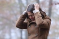 Desperate woman complaining alone in a park