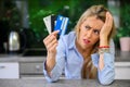 Desperate woman with credit cards