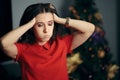 Desperate Woman Feeling Overwhelmed by Christmas Party Preparations