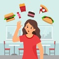 Desperate woman surrounded by sweet and fat nutrition, fast food and sweets floating around her. Royalty Free Stock Photo