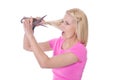 Desperate woman will cut her damaged blond hair - isolated. Royalty Free Stock Photo