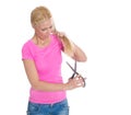 Desperate woman will cut her damaged blond hair. Royalty Free Stock Photo