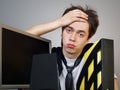 Desperate young businessman in the office Royalty Free Stock Photo