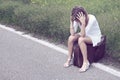 Desperate young girl on a suitcase