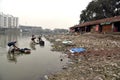 Dirty Laundry: Washerman wash clothes in polluted water