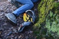 Despite protective equipment, the man ended up injured with a shattered helmet on the ground in the woods after falling from a bic