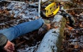 Despite protective equipment, the man ended up injured with a shattered helmet on the ground in the woods after falling from a bic