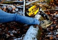 Despite protective equipment, the man ended up injured with a shattered helmet on the ground in the woods after falling from a bic