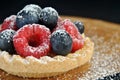 Tart with raspberries and blueberries