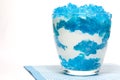 Dessert blue jelly in bowl with whipped cream