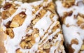 Dessert bread with white icing and nuts