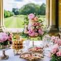 Dessert buffet with peony flowers, catering for wedding, party and holiday celebration, cakes and desserts in a countryside garden