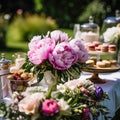 Dessert buffet with peony flowers, catering for wedding, party and holiday celebration, cakes and desserts in a countryside garden