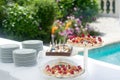 Dessert buffet, small chocolate and strawberry cakes, birthday candlees