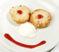 Dessert with cheesecakes and sour cream as a smile Royalty Free Stock Photo