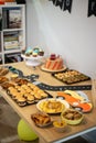 Dessert, chocolate and sweet cake food with toy cars on a birthday party decoration