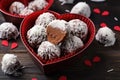 dessert chocolate truffles in a heart-shaped box for valentines day Royalty Free Stock Photo