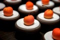 Desserts display on a white plate dark background