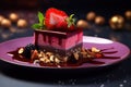 A dessert featuring a multi-layered cake with berry jelly, garnished with strawberries and mint