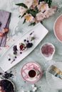 Dessert with flowers and coffee on the table Royalty Free Stock Photo