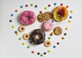 Dessert food and candy heart frame, donuts and cookies Royalty Free Stock Photo