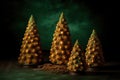 Dessert in the form of Christmas trees made of biscuit, chocolate and cookies