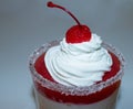 Dessert in a glass, decorated with fruits and mint. Royalty Free Stock Photo