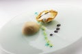 Dessert with glazed cassata half sphere and ice cream