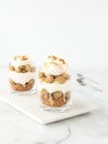 Dessert with Gooseberries, Cream and Biscuits in Glasses