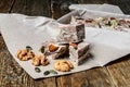 Dessert - halva and cup of coffee. Sweets on wooden table. Turkish delight concept. Top view. Royalty Free Stock Photo