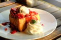 Dessert honey toast with ice cream and strawberry for romantic sweet time in valentine`s day Royalty Free Stock Photo