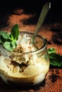 Dessert with ice cream and black coffee, decorated with chocolate chips and mint, selective focus Royalty Free Stock Photo