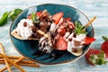 dessert with ice cream with fresh berries on a plate Royalty Free Stock Photo