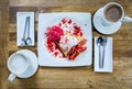 Dessert ice cream strawberry crepe and hot drink in coffee shop Royalty Free Stock Photo